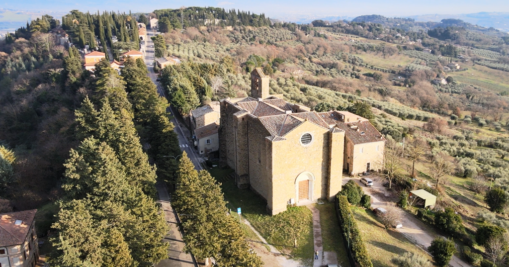 San Bevignate, Perugia, aerial view of the Templar church among olive groves and cypress trees